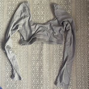 Long sleeved cropped shiny silver/purple shirt